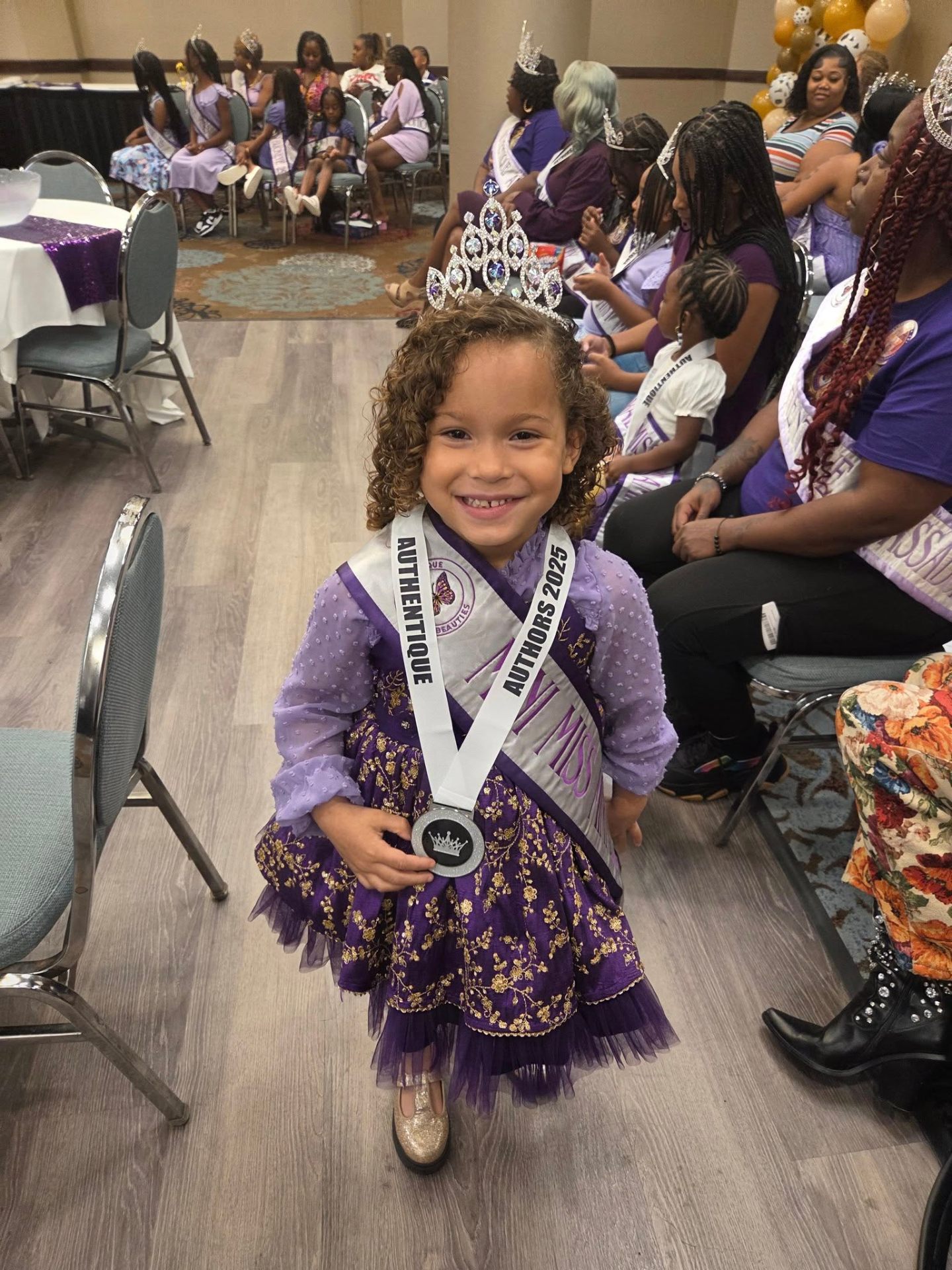 Lochlyn Rode with Authentique Authors 2025 medal
