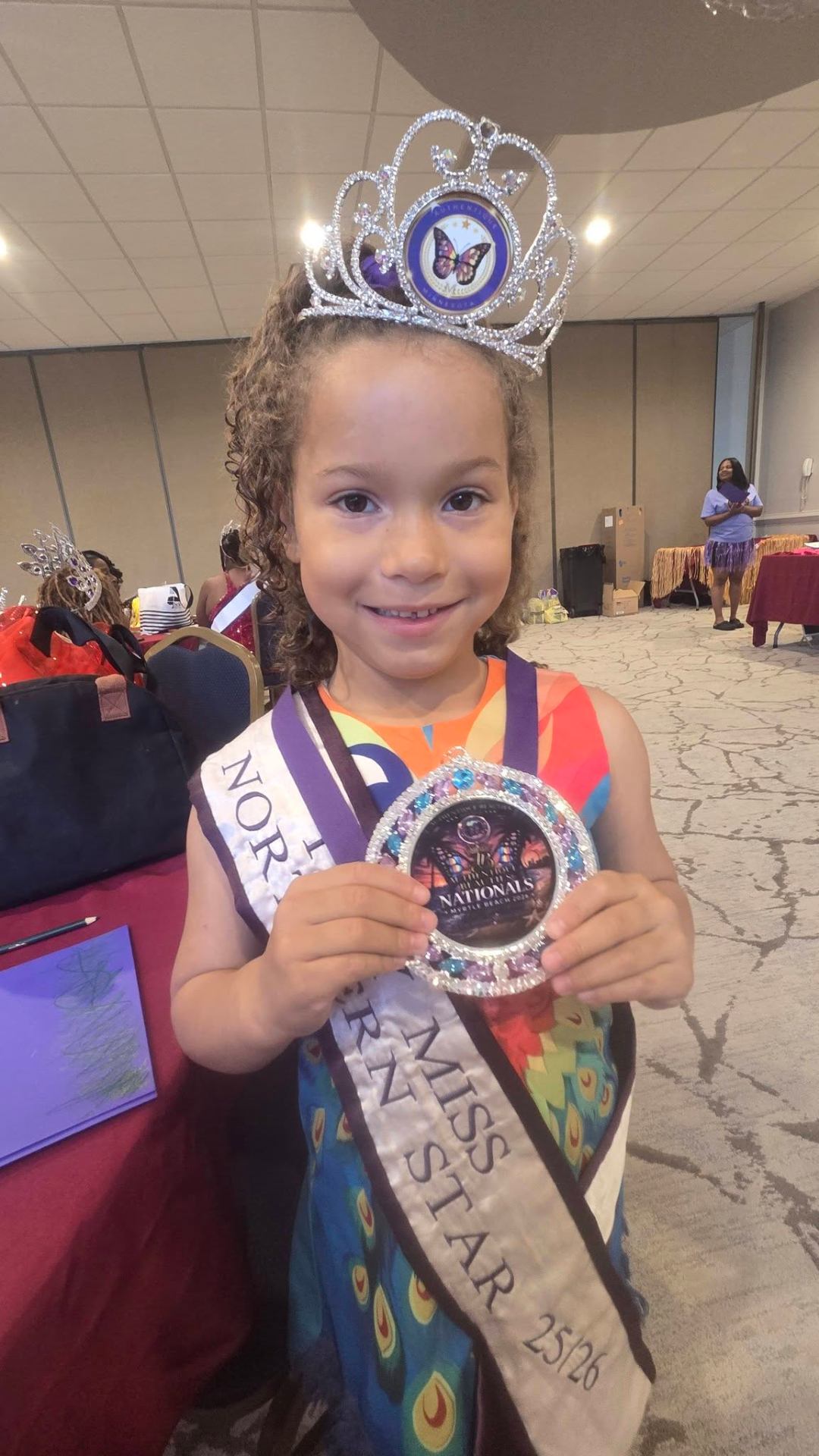 Madelyn Anderson with Nationals medallion